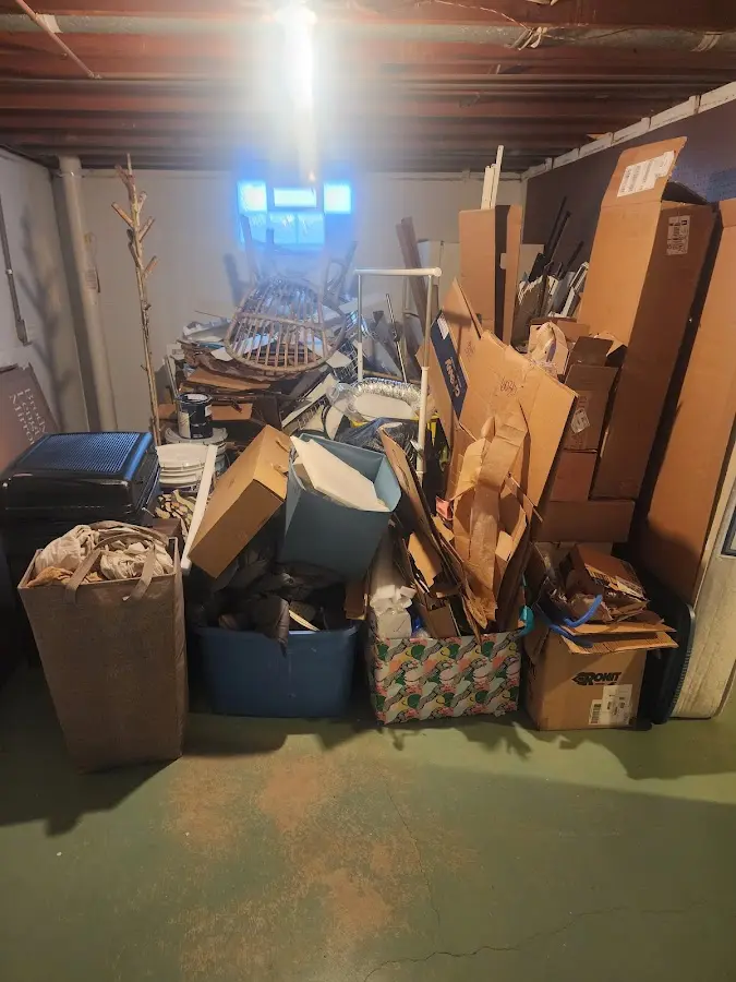 Roll-off dumpster container at job site for 4 Yard Dumpster Rental in Cherokee